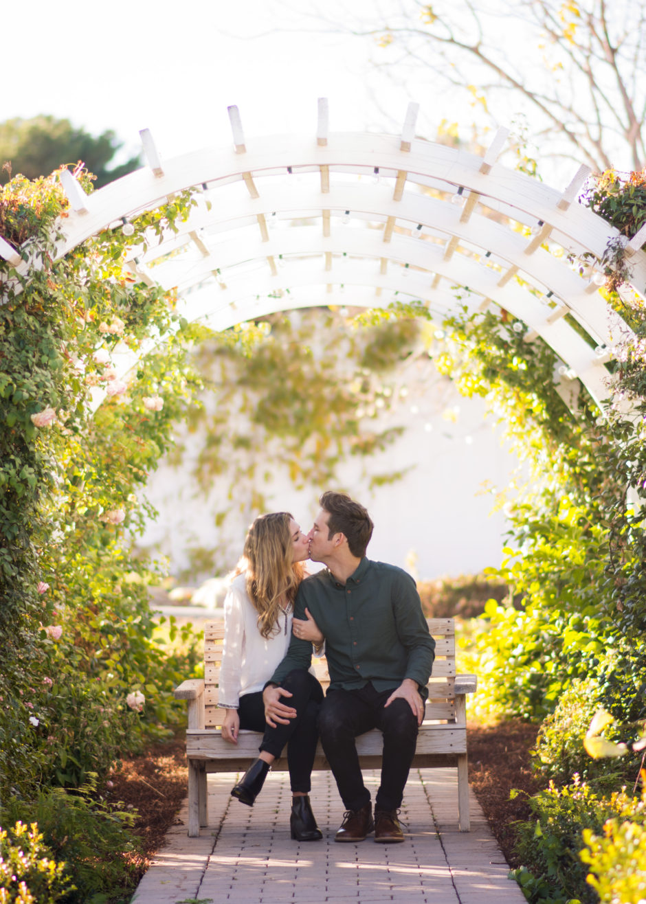 Couple kissing in Gilbert, AZ photographed by Jubilee Family Photography.