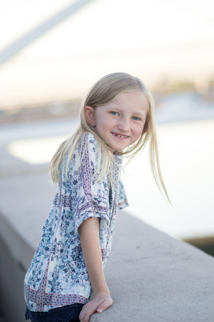Blond girl at Tempe Town Lake for family portrait session. Photographer Melissa Maxwell of Jubilee Family Photography in Gilbert, AZ.