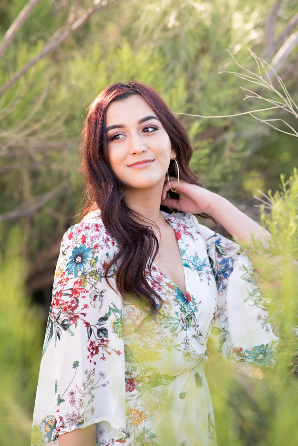 Graduating senior girl photographed at Riparian Preserve in Gilbert, Arizona by photographer Melissa Maxwell of Jubilee Family Photography.